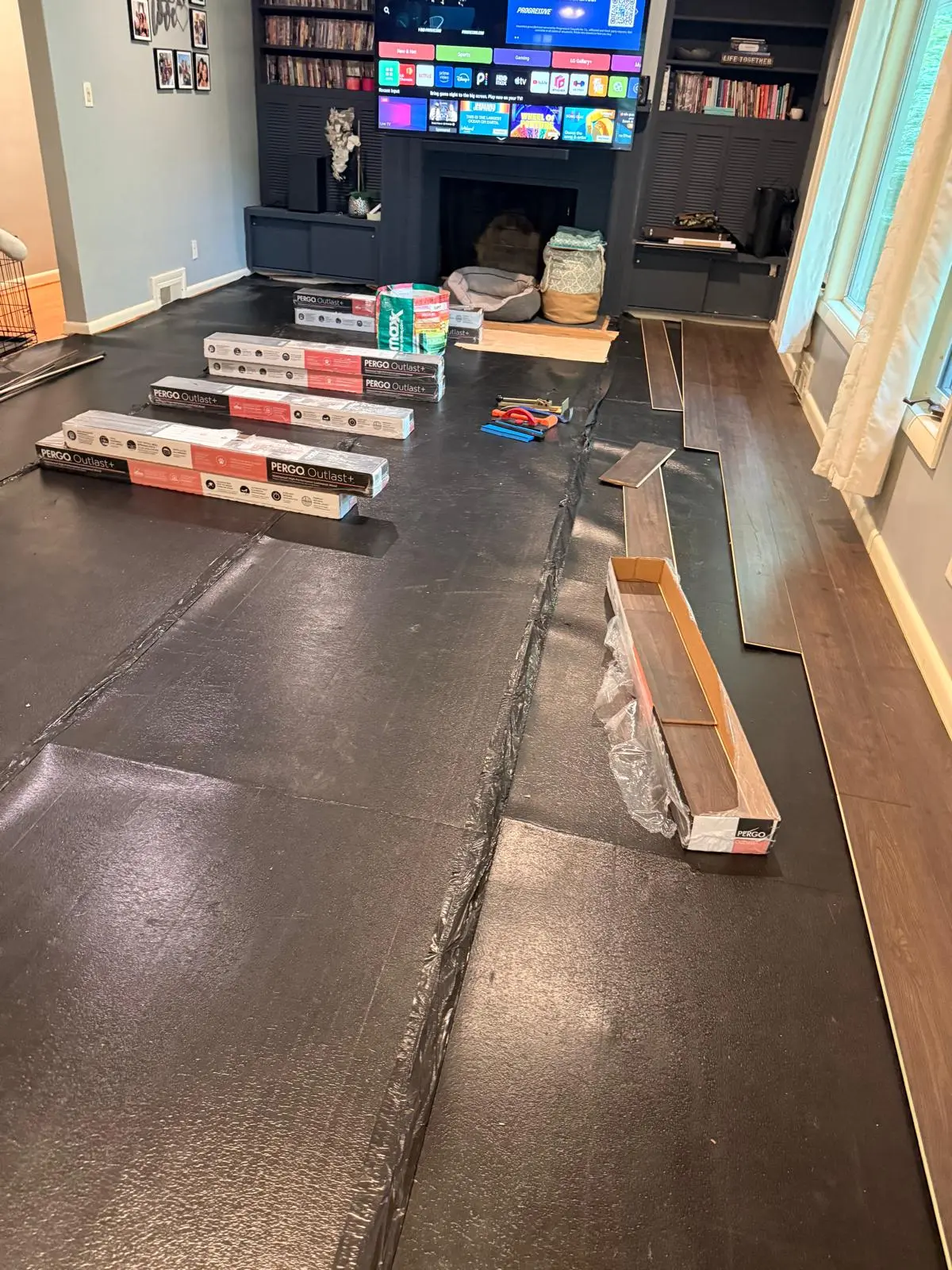 Vinyl plank flooring installation in progress