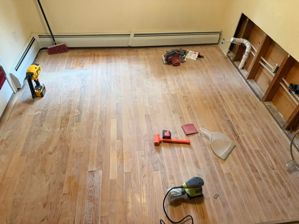 Flooring installation with tools in the work area